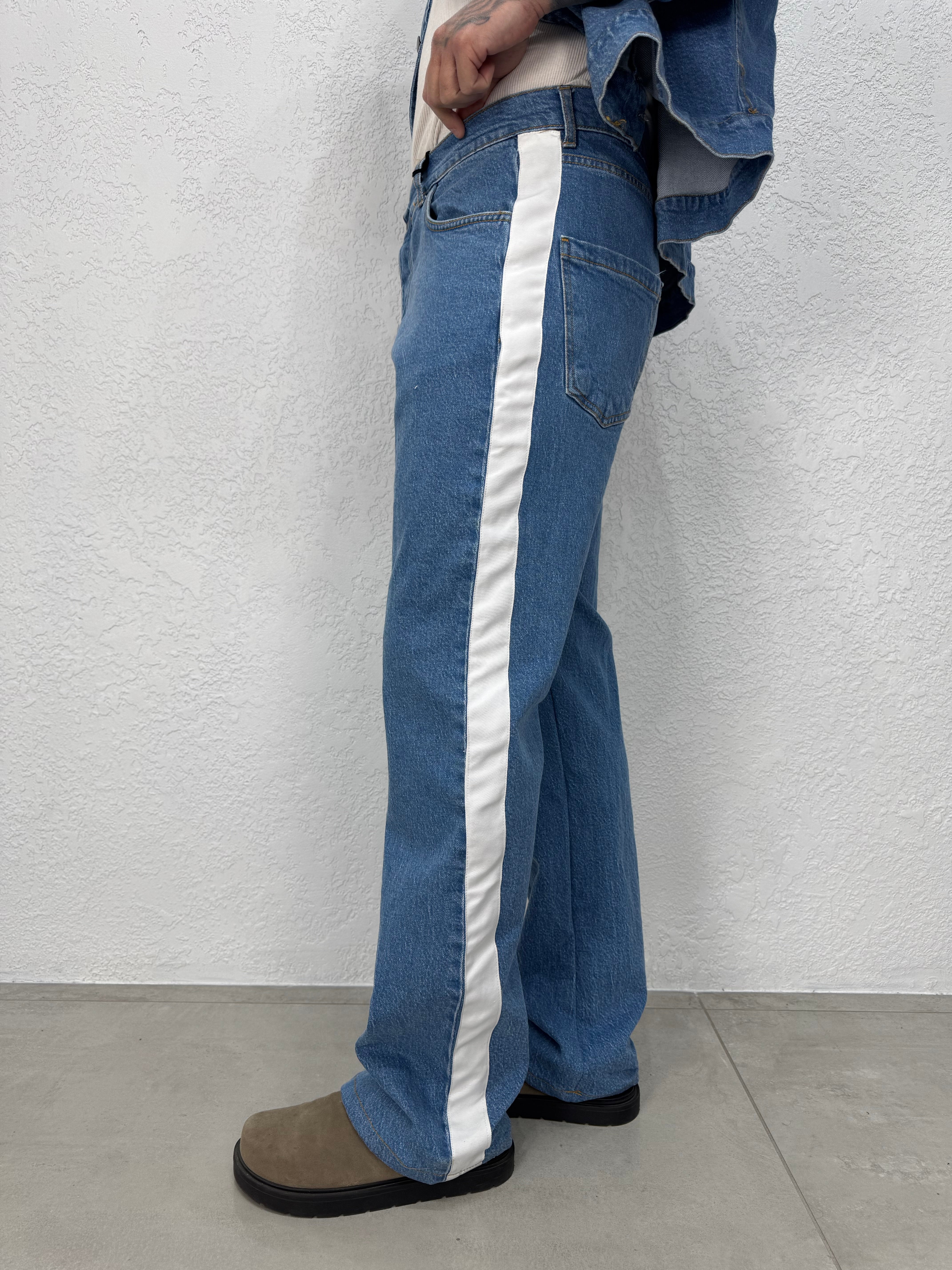 JEANS CON BANDA