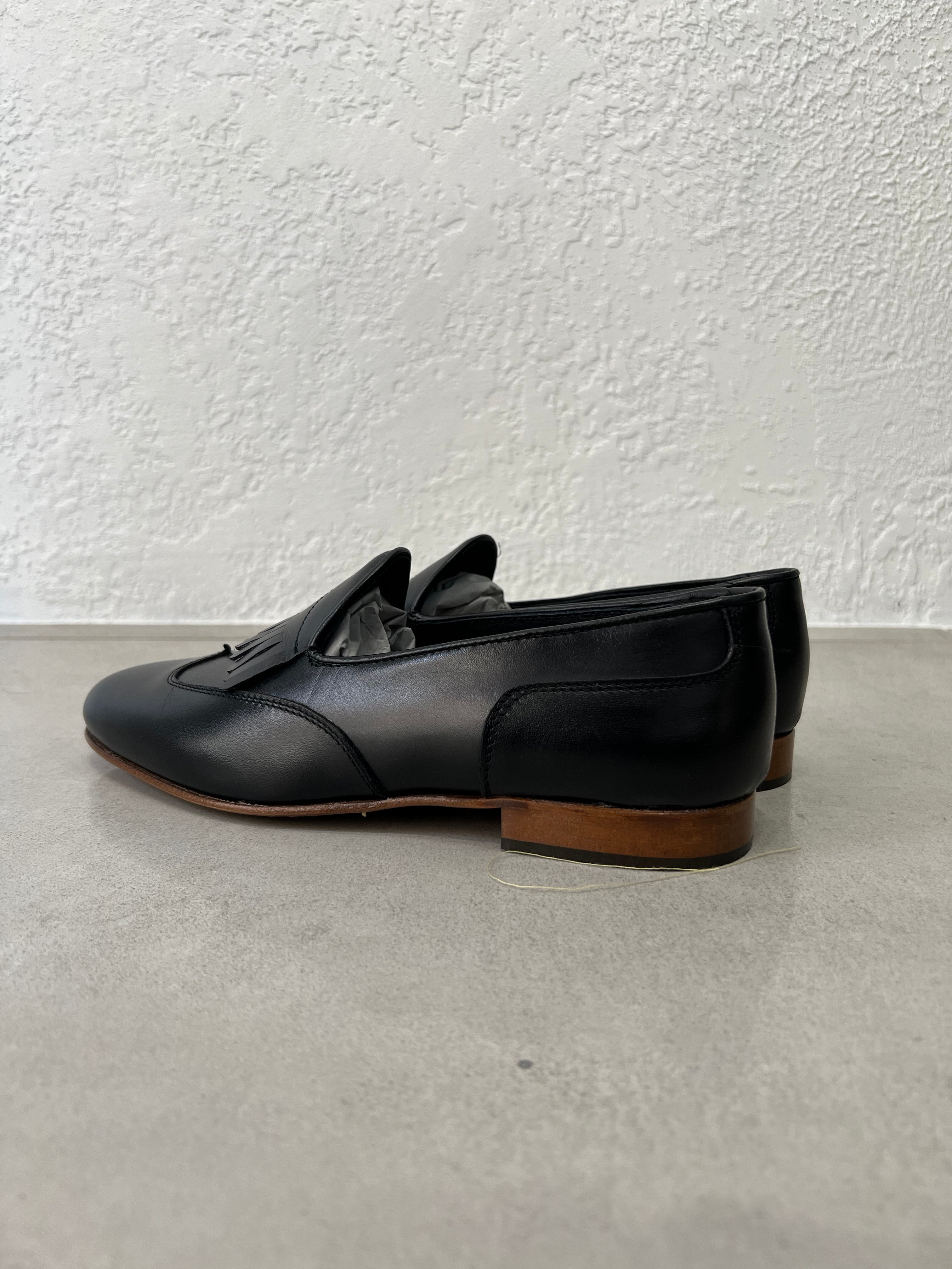 MOCASSINO IN PELLE CON FRANGE