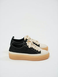 SNEAKERS NERA CON SUOLA OSSO