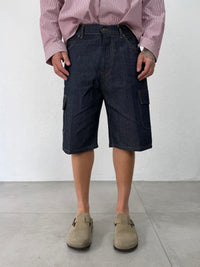 BERMUDA RAW DENIM CON TASCONI