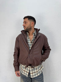 JACKET EFFETTO PELLE CON COULISSE REGOLABILE