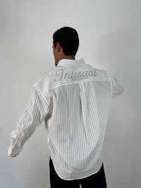 CAMICIA INUSUAL RIGATA CELESTE/NERO CON RICAMO