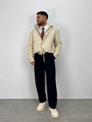 JACKET EFFETTO PELLE CON COULISSE REGOLABILE