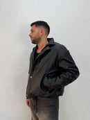 JACKET EFFETTO PELLE CON COULISSE REGOLABILE