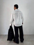 CAMICIA INUSUAL RIGATA CELESTE/NERO CON RICAMO