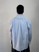 CAMICIA INUSUAL RIGATA CELESTE CON RICAMO