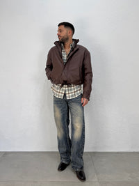 JACKET EFFETTO PELLE CON COULISSE REGOLABILE
