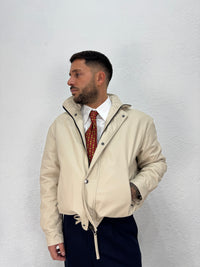 JACKET EFFETTO PELLE CON COULISSE REGOLABILE